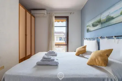 Letto o letti in una camera di Casa Daniela