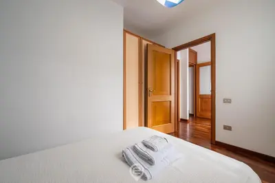 Letto o letti in una camera di Casa Daniela