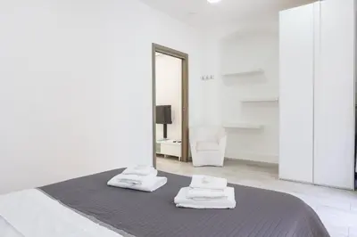 Letto o letti in una camera di Rainbow Marina Apartment