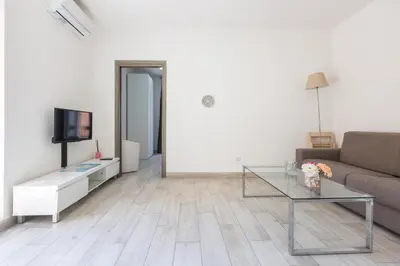 TV o dispositivi per l'intrattenimento presso Rainbow Marina Apartment