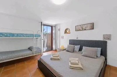 Letto o letti in una camera di Casa Dani