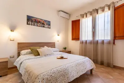 Letto o letti in una camera di Casa Teo