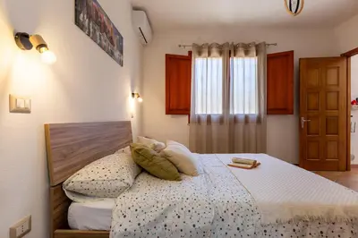 Letto o letti in una camera di Casa Teo