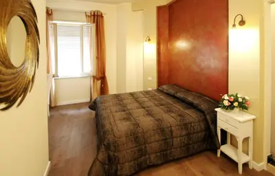 Letto o letti in una camera di All'Operetta di Cagliari