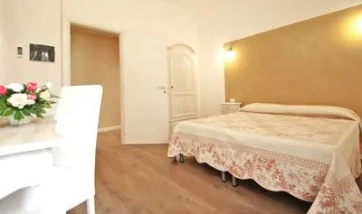 Letto o letti in una camera di All'Operetta di Cagliari