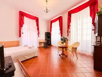 Letto o letti in una camera di Suite Palazzo Atzeni Tedesco, Historical Center