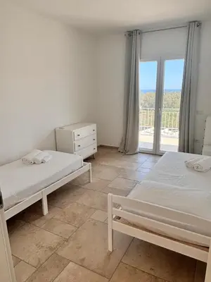 Letto o letti in una camera di Casa Ottava Luna -Relax in un oasi di tranquillità