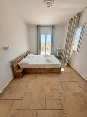 Letto o letti in una camera di Casa Ottava Luna -Relax in un oasi di tranquillità