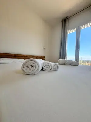 Letto o letti in una camera di Casa Ottava Luna -Relax in un oasi di tranquillità