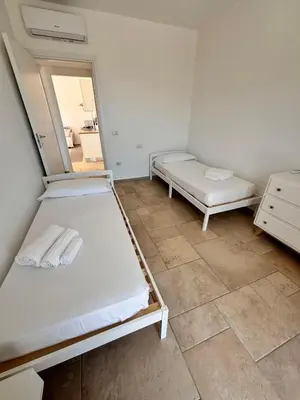 Letto o letti in una camera di Casa Ottava Luna -Relax in un oasi di tranquillità
