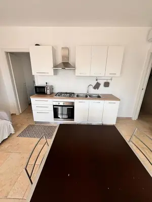 Cucina o angolo cottura di Casa Ottava Luna -Relax in un oasi di tranquillità