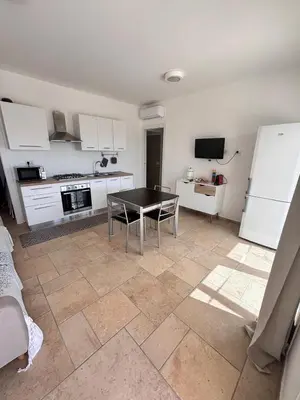 Cucina o angolo cottura di Casa Ottava Luna -Relax in un oasi di tranquillità