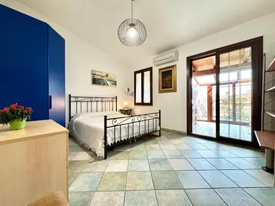 Letto o letti in una camera di La Corte Azzurra Terrace