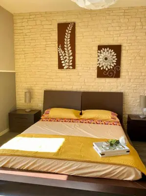 Letto o letti in una camera di Maison Eclat