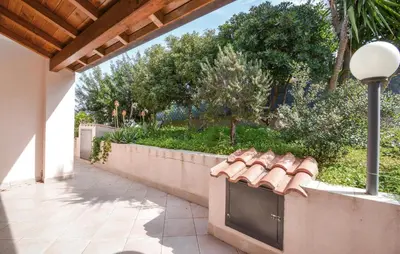 Giardino di Cozy Home In Torre Dei Corsari