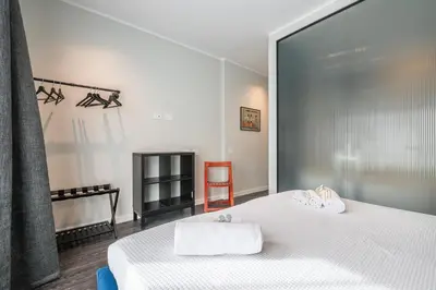 Letto o letti in una camera di Saint Margaret Apartments