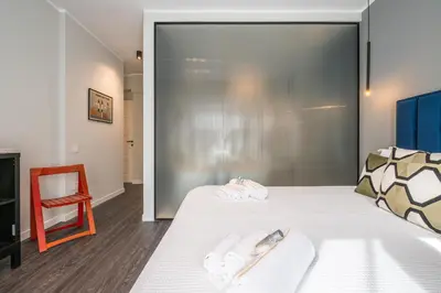 Letto o letti in una camera di Saint Margaret Apartments