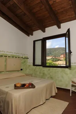 Letto o letti in una camera di casa da Anita