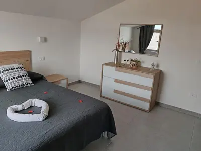 Letto o letti in una camera di Casa Aurora San Sperate