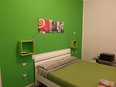 Letto o letti in una camera di Da Laura