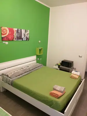 Letto o letti in una camera di Da Laura