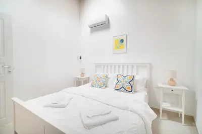 Letto o letti in una camera di La Sarda Holiday Homes