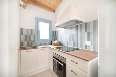 Cucina o angolo cottura di La Sarda Holiday Homes