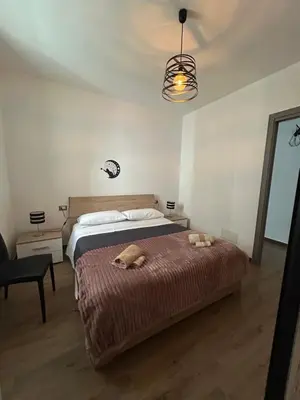 Letto o letti in una camera di Dimora Cabiria
