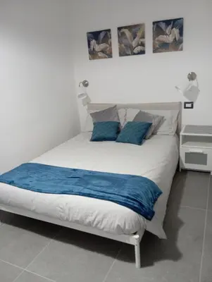 Letto o letti in una camera di La Piccola Gemma