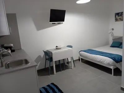 Letto o letti in una camera di La Piccola Gemma