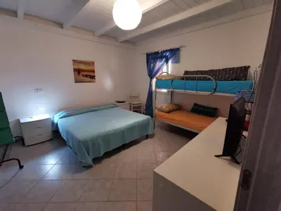 Letto o letti in una camera di Casa Diego