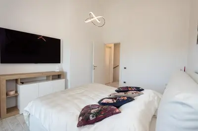 Letto o letti in una camera di Villa Tetty - Garden & private pool near the sea