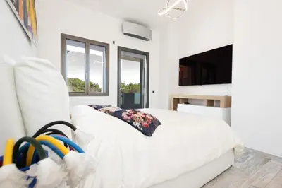 TV o dispositivi per l'intrattenimento presso Villa Tetty - Garden & private pool near the sea