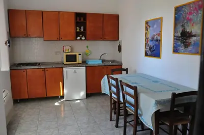 Cucina o angolo cottura di Sa Teria Village - Appartamenti -