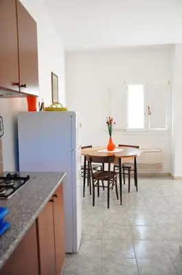 Cucina o angolo cottura di Sa Teria Village - Appartamenti -