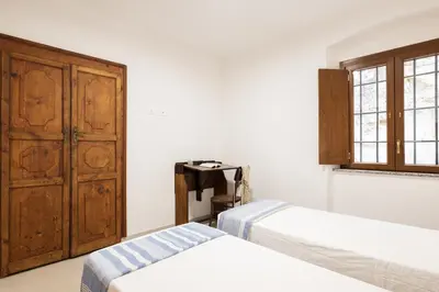 Letto o letti in una camera di Casa Sulis Holiday Home