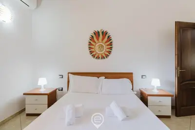Letto o letti in una camera di Mauri's house