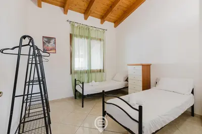 Letto o letti in una camera di Mauri's house