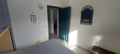 Letto o letti in una camera di Villa Rosa