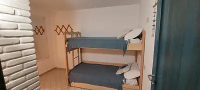 Letto o letti in una camera di Villa Rosa
