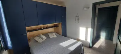 Letto o letti in una camera di Villa Rosa