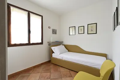 Letto o letti in una camera di Appartamento vicino al mare Bacu e Ludu B