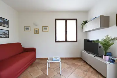 TV o dispositivi per l'intrattenimento presso Appartamento vicino al mare Bacu e Ludu B