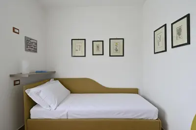 Letto o letti in una camera di Appartamento vicino al mare Bacu e Ludu B