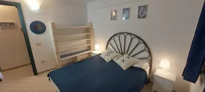 Letto o letti in una camera di Villa Tonino