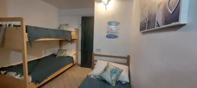 Letto o letti in una camera di Villa Tonino