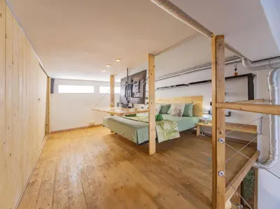 Letto o letti in una camera di Loft Serenità