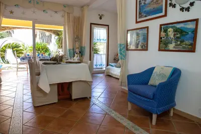Area soggiorno di Baia Verde - Seaside Peaceful Luxury Villa with Garden in Sardinia - 300 mt beach&sea - relax, privacy & full comfort