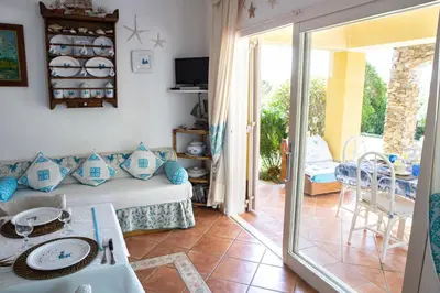 Area soggiorno di Baia Verde - Seaside Peaceful Luxury Villa with Garden in Sardinia - 300 mt beach&sea - relax, privacy & full comfort