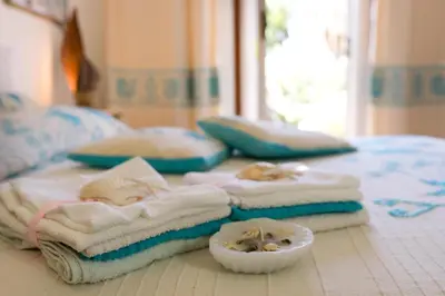 Letto o letti in una camera di Baia Verde - Seaside Peaceful Luxury Villa with Garden in Sardinia - 300 mt beach&sea - relax, privacy & full comfort